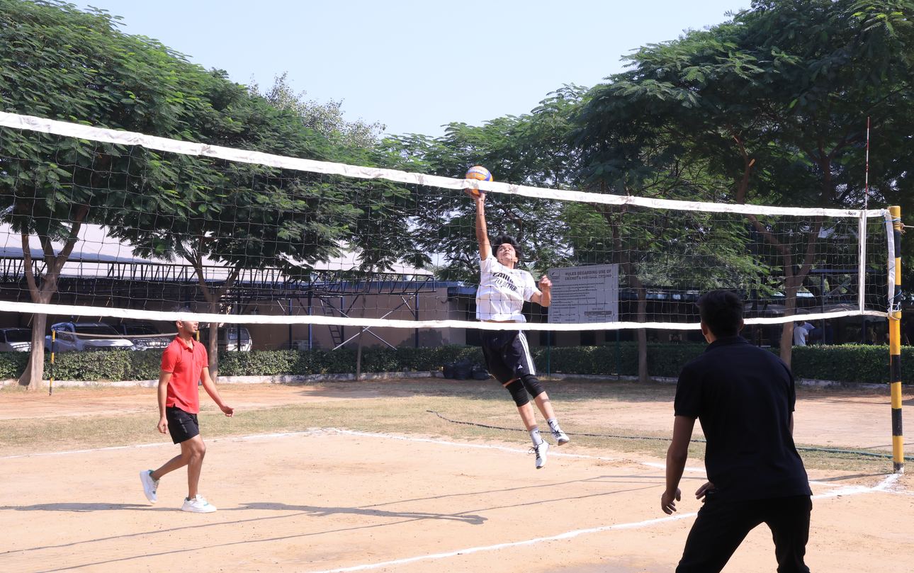 A volleyball match on the campus court